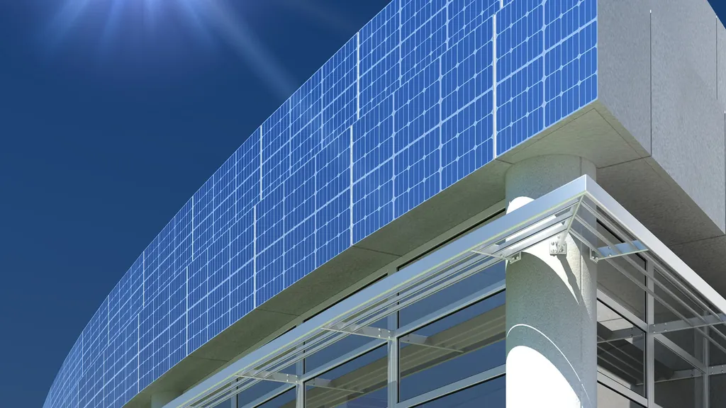 Curved glass building facade clad with solar modules